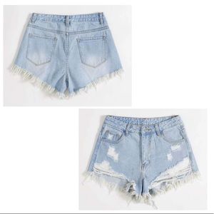 Women’s light-blue ripped denim Jean shorts XS (3)